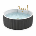 Baignoire îlot ronde en acrylique noir et blanc avec robinetterie dorée, 150 × 60 cm
