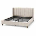 Lit double rembourré beige 218 × 170 × 112 cm pour matelas 160 × 200 cm, tête de lit à canaux verticaux et sommier métallique
